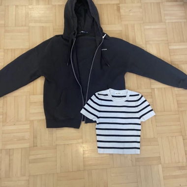 Black hooded jacket with striped shirt