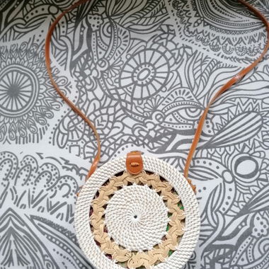 Round bast bag with shoulder strap