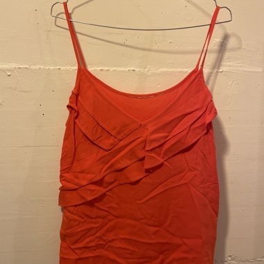 Top rosso corallo con ruches