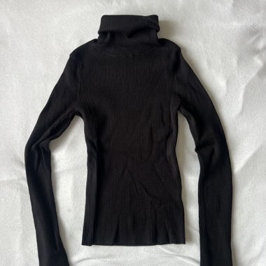 Black roll-neck sweater