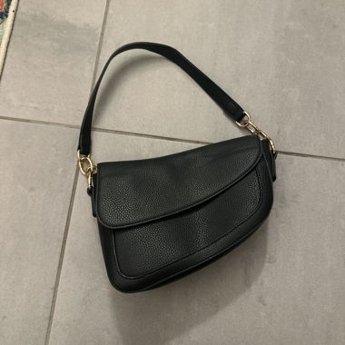 Black shoulder bag with gold details