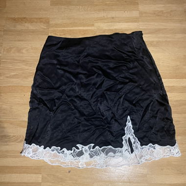 black skirt with lace at the bottom
