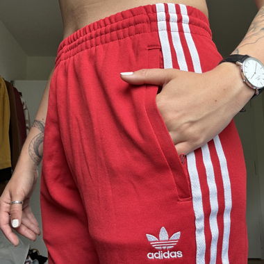 red adidas joggers in s