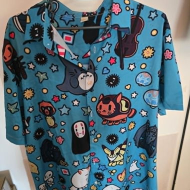 Bluse blau mit Fantasiemotiven