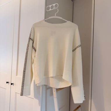 White long-sleeve sweater