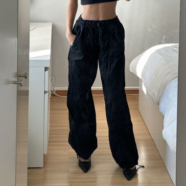 Black parachute pants