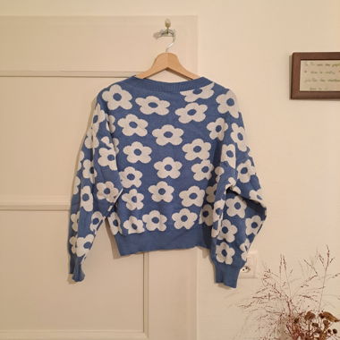 Blue pullover with white flowers