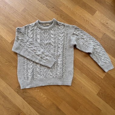 maglione a trecce