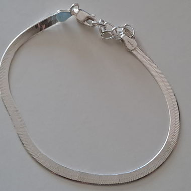 Bracelet argenté (serpent / chevrons)