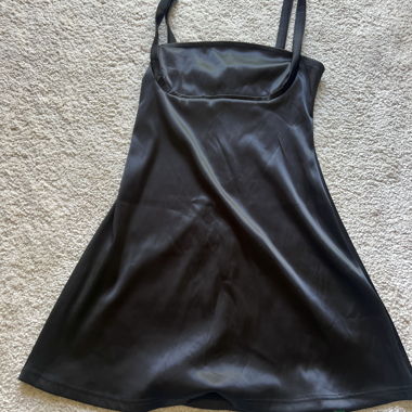 Short black dress in silk with square collar