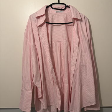 Blusa a righe rosa e bianca