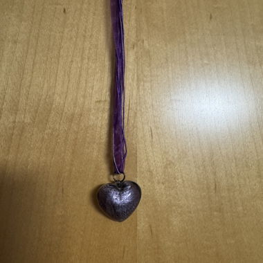 Necklace with fabric ribbon and heart pendant
