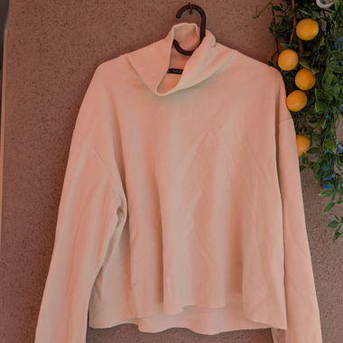 Maglione dolcevita color crema