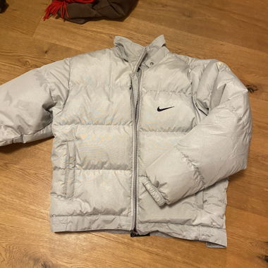 Nike feather puffer jacket 