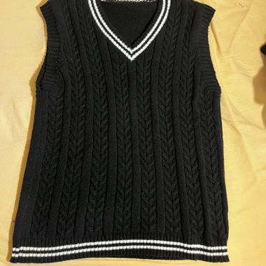 Black sleeveless sweater