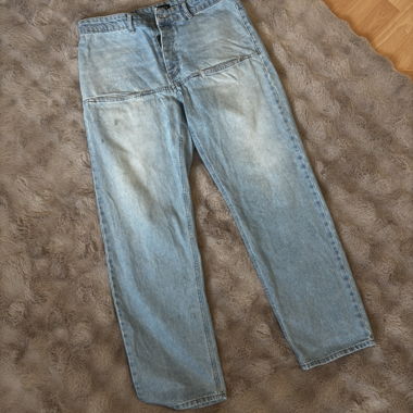 Jeans con tasche davanti