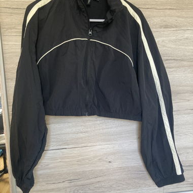 Black sports jacket with white stripes