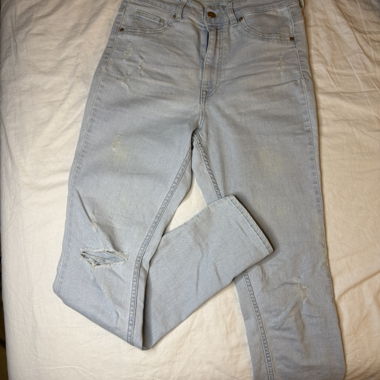 Light blue ripped jeans