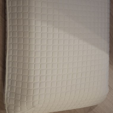 Ergonomic pillow for side and back sleepers