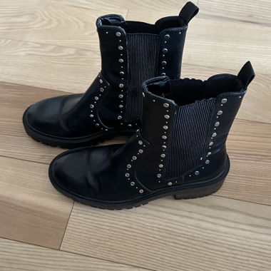 Black ankle boots with studs