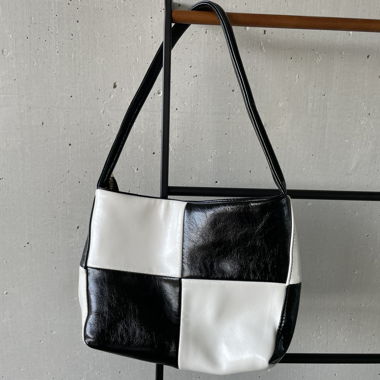 Schwarz-weisse Schultertasche