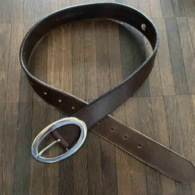 Leather belt with metal buckle