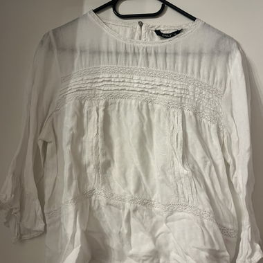 Blusa senza tempo con pizzo