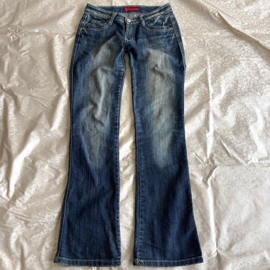 Low rise white stitched bootcut denim jeans