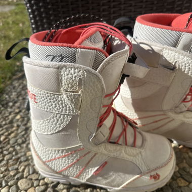 White snowboard boots with red accents