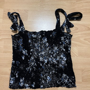 Black top with floral pattern
