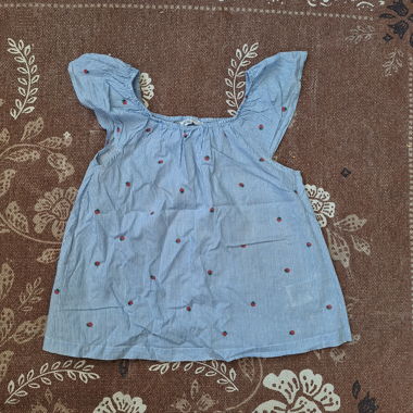 Girls' blue striped top with little strawberries