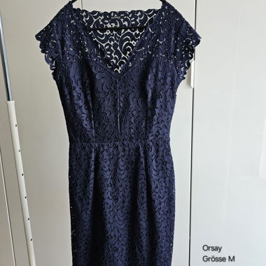 Figure-flattering lace dress from Orsay