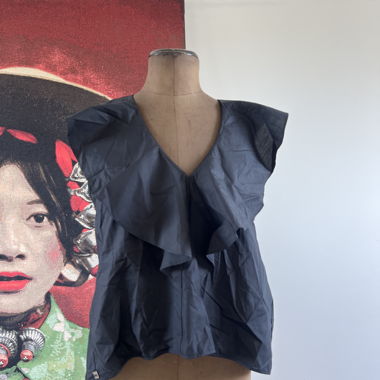 Schwarze Rueschen-Top Bluse