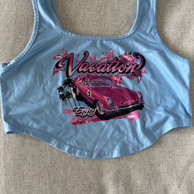 Blue top with pink logo