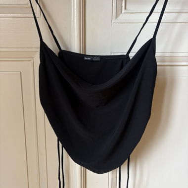 Black top with thin straps