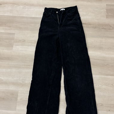 Wide black corduroy trousers Subdued