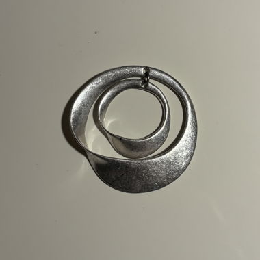 Silver pendant for a necklace