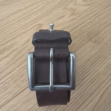 Leather belt with metal buckle