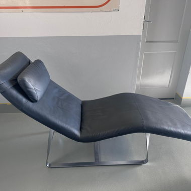 Poltrone lounge lunghe curve Rolf Benz grigie in pelle