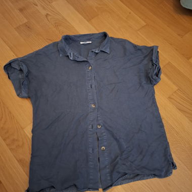 Blusa blu a maniche corte