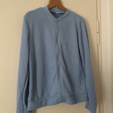 Cardigan in maglia azzurro chiaro con zip