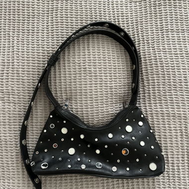 Black shoulder bag with studs