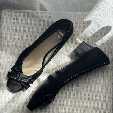 Black low heel flats