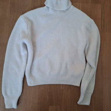Ecru rib-knit turtleneck sweater