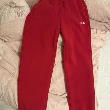 Pantaloni da jogging cusbclo rossi con risvolto