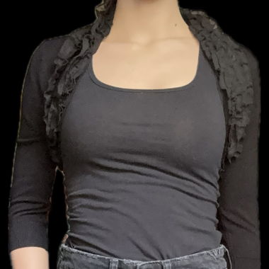 Mini veste noire à volants