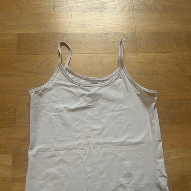 Basic white tank top with thin straps