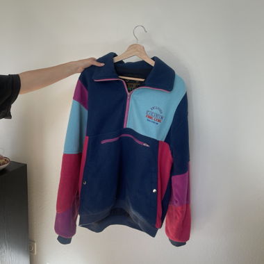 Pull polaire multicolore zippé