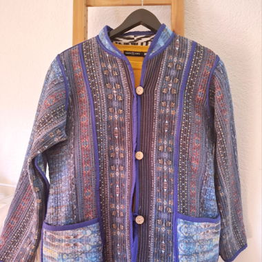 Veste reversible couleur bleu/noir-blanc taille M