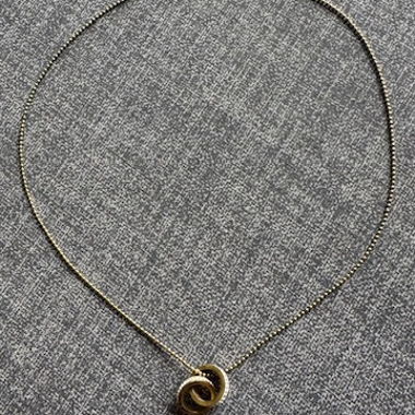 Collier acier inoxydable anneau entrelacé